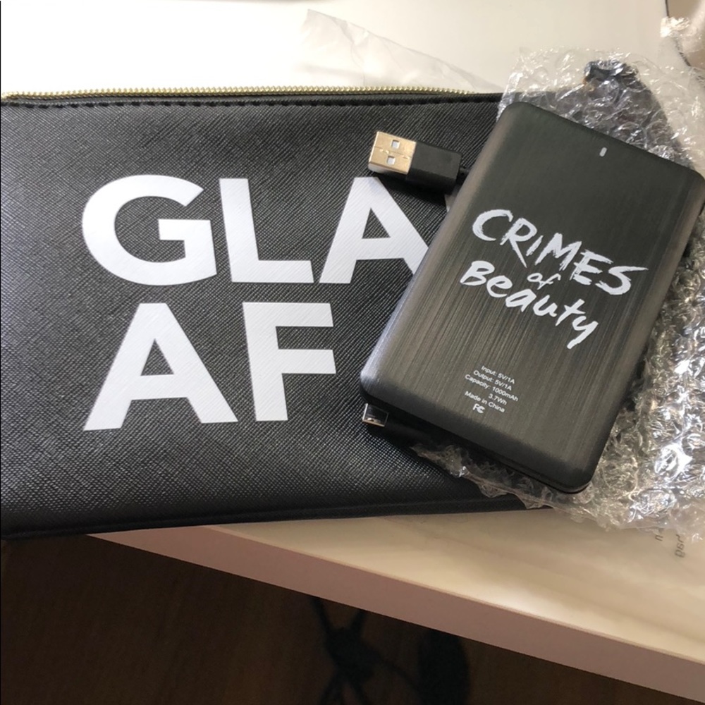 Crimes of Beauty wristlet and portable charger